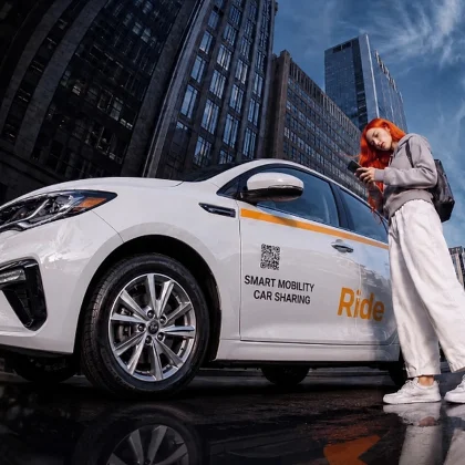 Rider unlocking a Ride carsharing car with the mobile app in Manhattan